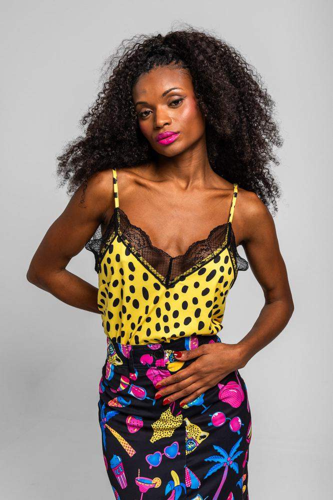 Blusa lencera animal print amarillo y negro