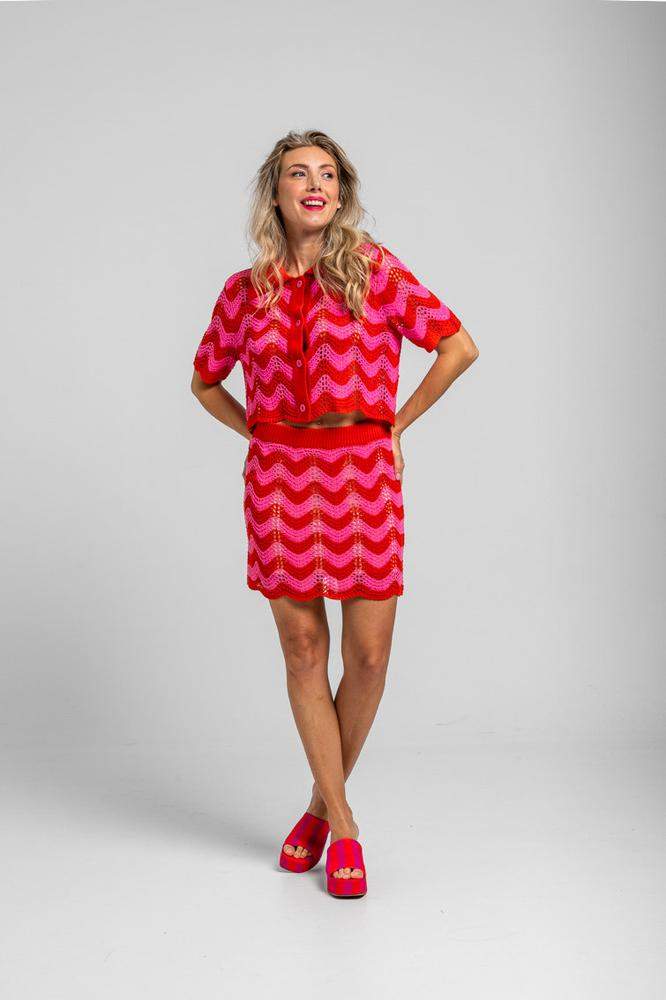 Minifalda calada de ondas rosas y rojas 