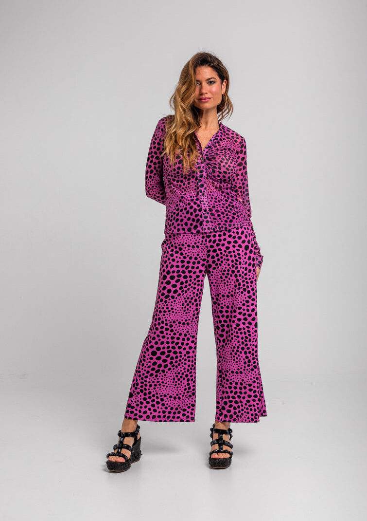 Pantalón flare elástico animal print rosa y negro